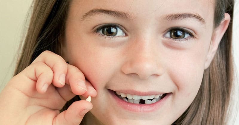 علت لق شدن دندان کودکان چیست؟